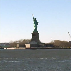 Riding on the Staten Island Ferry past the Statue of Liberty National Monument